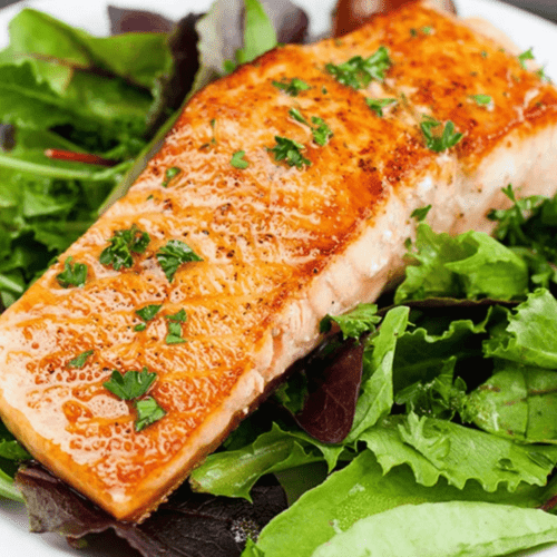 For extra flavor, you can marinate the salmon in lemon juice, garlic, and herbs before cooking. Substitute greens with kale or spinach for a heartier salad. For a creamy twist, add a dollop of Greek yogurt to the dressing.